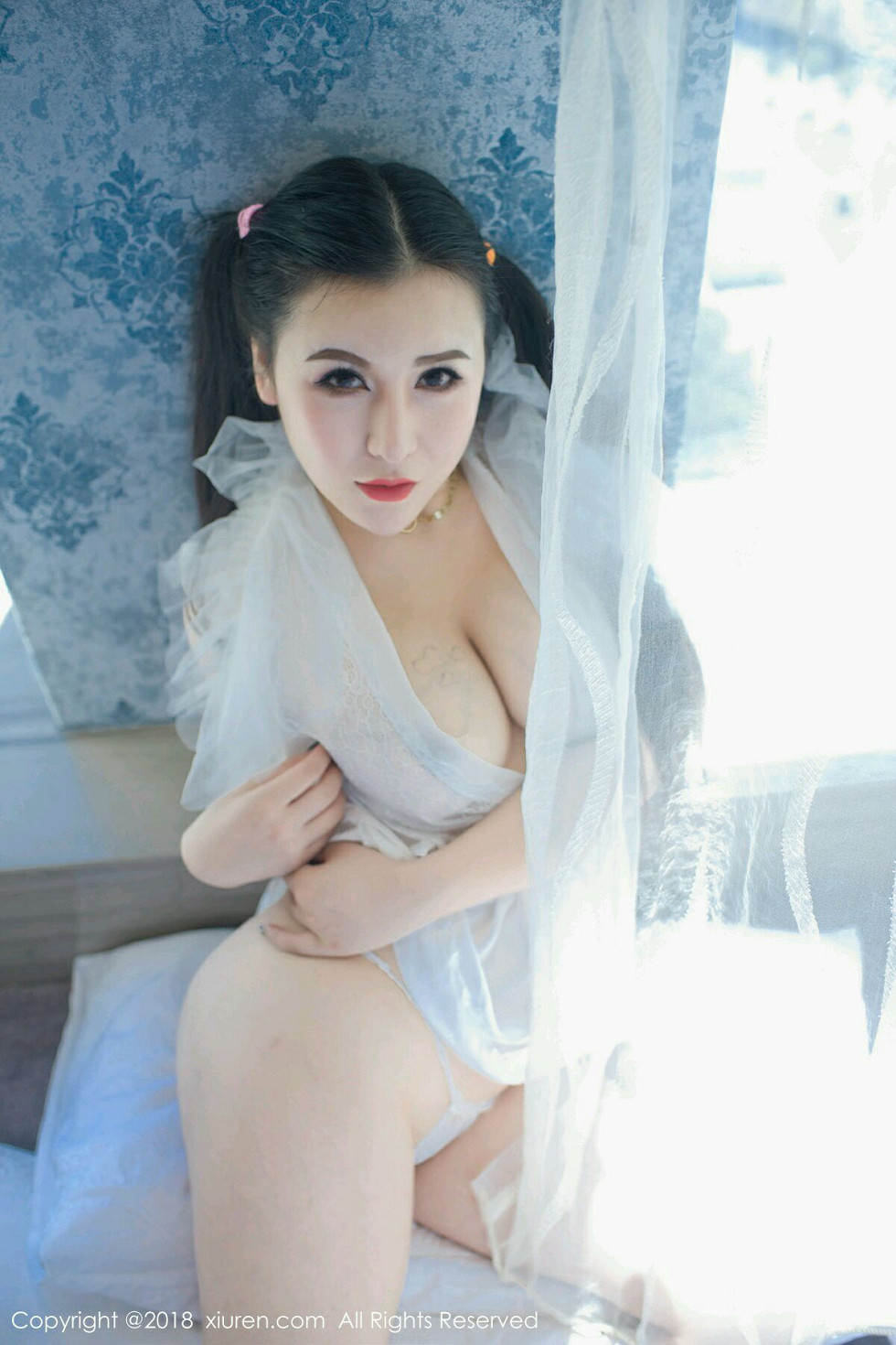 XiuRen第1034期_嫩模MODEL伊若蕾丝开胸睡衣+带子死库水完美爆乳诱惑写真45P